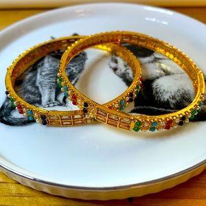 Beautiful set of 2 gold toned gemstones bangles